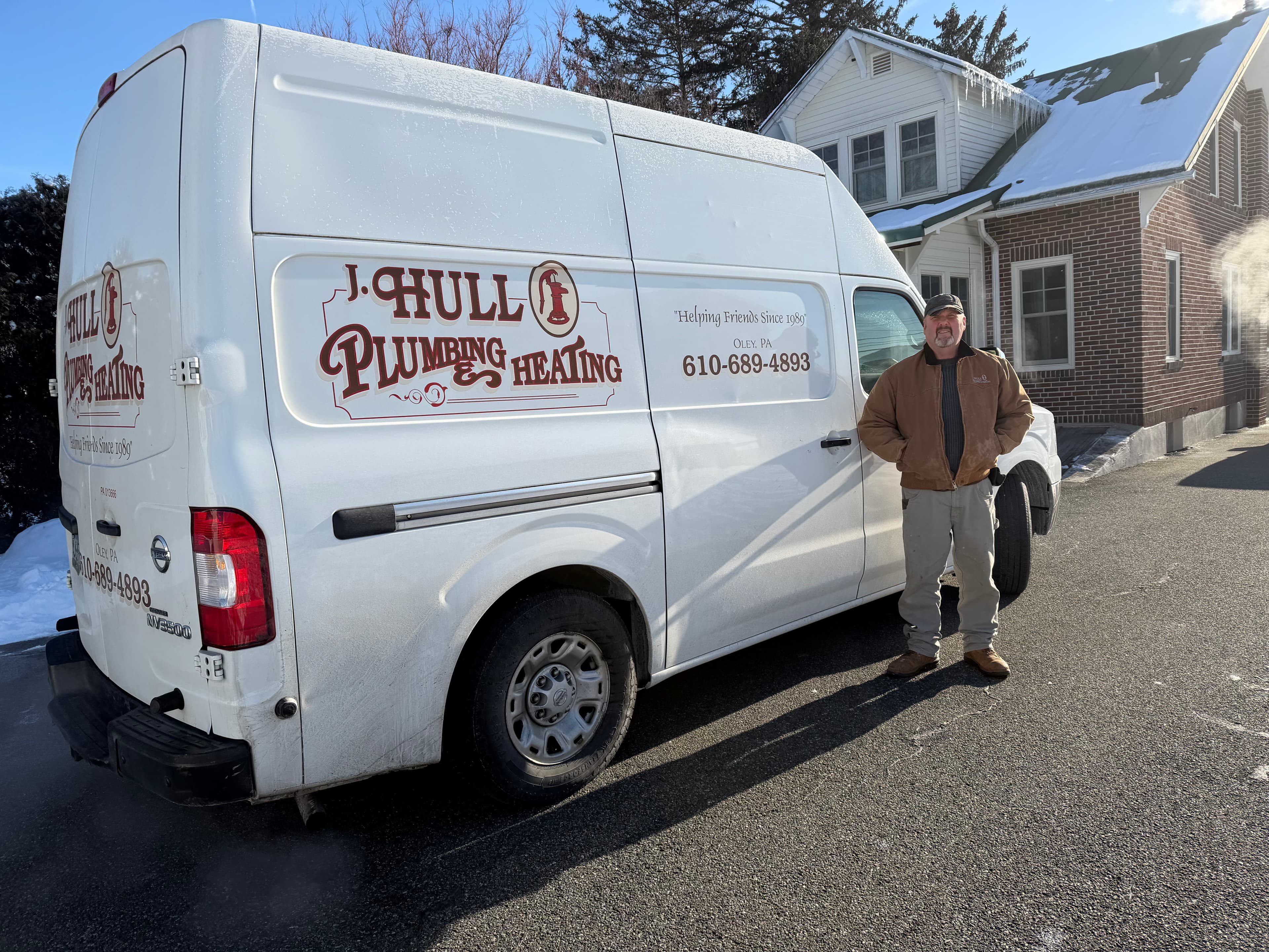 Owner working on plumbing equipment